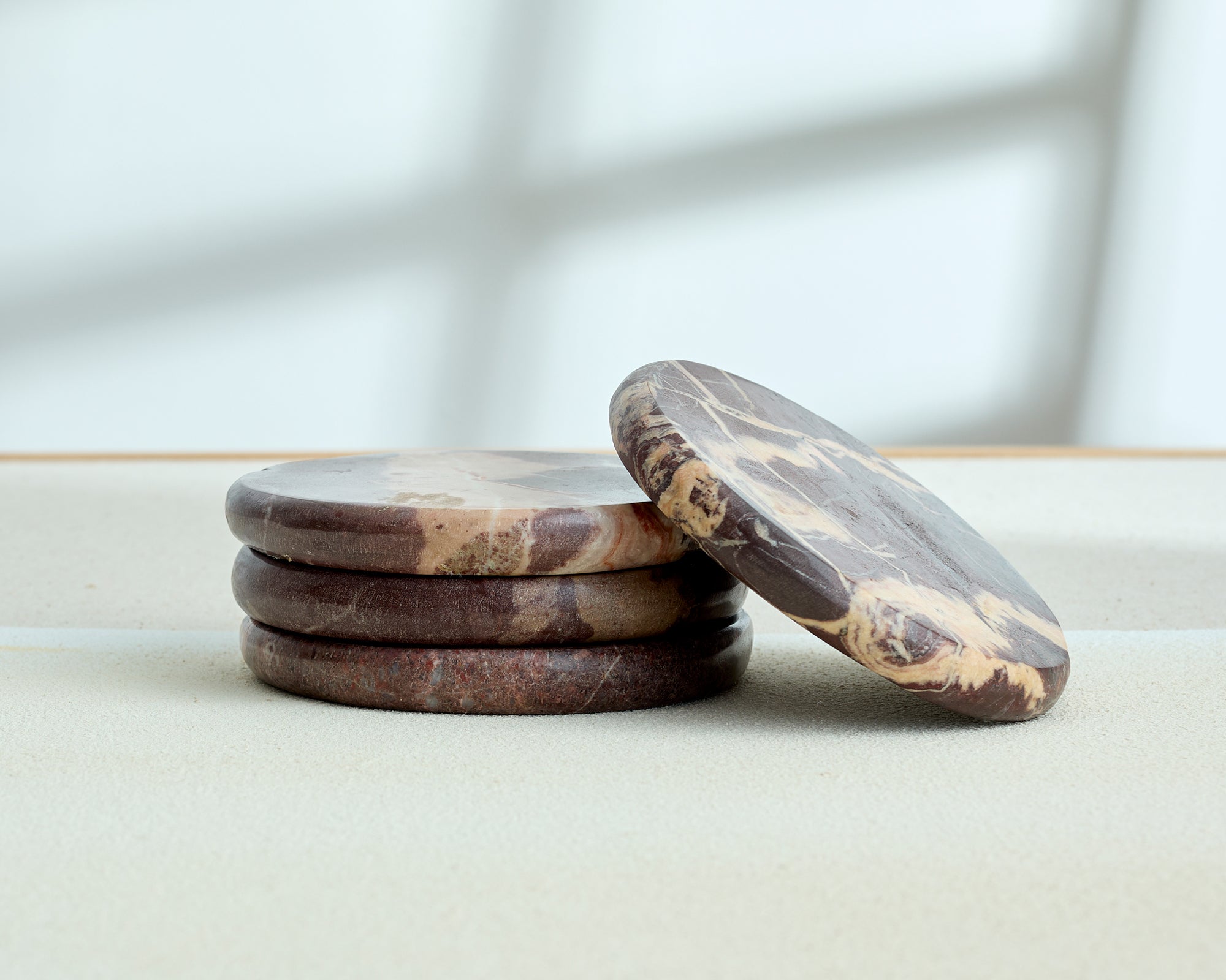 Modern Round Shape Rosso Levanto Polished Marble Coasters from What a Host Home